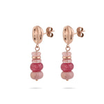 Paar Tamaris Tropfen-Ohrringe in Roségold mit rosa Schmucksteinen, seitliche Ansicht mit Stecker-Verschluss.