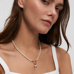 Tamaris Damen Perlenkette mit weißen Perlen und roségoldfarbenem Ringelement, kombiniert mit verschiedenen Charms!