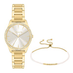 Tamaris Set aus goldfarbener Damenuhr mit Zirkonia-Lünette und passendem Armband mit weißen Perlen und Zugverschluss.