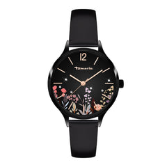 Die Tamaris Armbanduhr - Romantic Flowers besticht mit floralem Zifferblatt, schwarzem Lederarmband und Tamaris Logo - eine elegante Damenuhr für stilbewusste Trägerinnen.