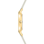 Seitenansicht der Tamaris Armbanduhr - The Flower von Tamaris, mit goldenem Gehäuse, weißem Silikonarmband, schmalem Profil und Kronenknopf.