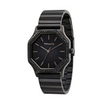 Die Tamaris Armbanduhr - Sparkling Octavia ist eine schlichte, schwarze, achteckige Uhr mit minimalistischem Zifferblatt und robustem Edelstahlarmband, die die moderne Eleganz der Marke Tamaris vereint.