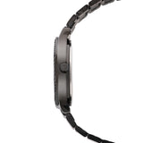 Seitenansicht der Tamaris Armbanduhr - Sparkling Octavia von Tamaris, bestehend aus einem schwarzen Edelstahlarmband mit eleganten Gliedern und einem runden Gehäuse, einige Glieder sind mit funkelnden Zirkoniasteinen verziert.
