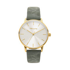 Die Tamaris Armbanduhr - Stamped Flowers von Tamaris verfügt über ein silbernes Zifferblatt, minimalistische Markierungen und ein schickes grünes Lederarmband mit dezentem Blattmuster - perfekt für stilvolle Outfits.