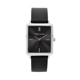 Die Tamaris Armbanduhr - The Silicon Square hat ein quadratisches schwarzes Design, ein schwarzes Silikonarmband und minimalistische silberne und goldene Markierungen - perfekt für eine sportliche Damenuhr.