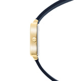 Seitenansicht der Tamaris Armbanduhr - The Silicon Square von Tamaris mit goldenem Gehäuse und schwarzem Lederarmband, dargestellt auf weißem Hintergrund.