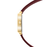 Seitenansicht der Tamaris Armbanduhr - The Silicon Square von Tamaris mit goldenem Gehäuse, bordeauxfarbenem Silikonarmband und seitlicher Krone - eine stilvolle Sportuhr für Damen, perfekt für jede Gelegenheit.