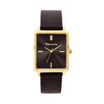 Die Tamaris Armbanduhr - The Silicon Square verfügt über ein rechteckiges, goldenes Gehäuse, ein schwarzes Zifferblatt mit minimalen Markierungen und ein elegantes Silikonband und bietet einen modernen, sportlichen Look der Marke Tamaris auf weißem Hintergrund.