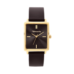 Die Tamaris Armbanduhr - The Silicon Square verfügt über ein rechteckiges, goldenes Gehäuse, ein schwarzes Zifferblatt mit minimalen Markierungen und ein elegantes Silikonband und bietet einen modernen, sportlichen Look der Marke Tamaris auf weißem Hintergrund.