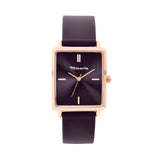 Die Tamaris Armbanduhr - The Silicon Square hat ein quadratisches Zifferblatt, ein schwarzes Silikonarmband, ein goldenes Gehäuse und ein minimalistisches Design auf weißem Hintergrund von Tamaris.